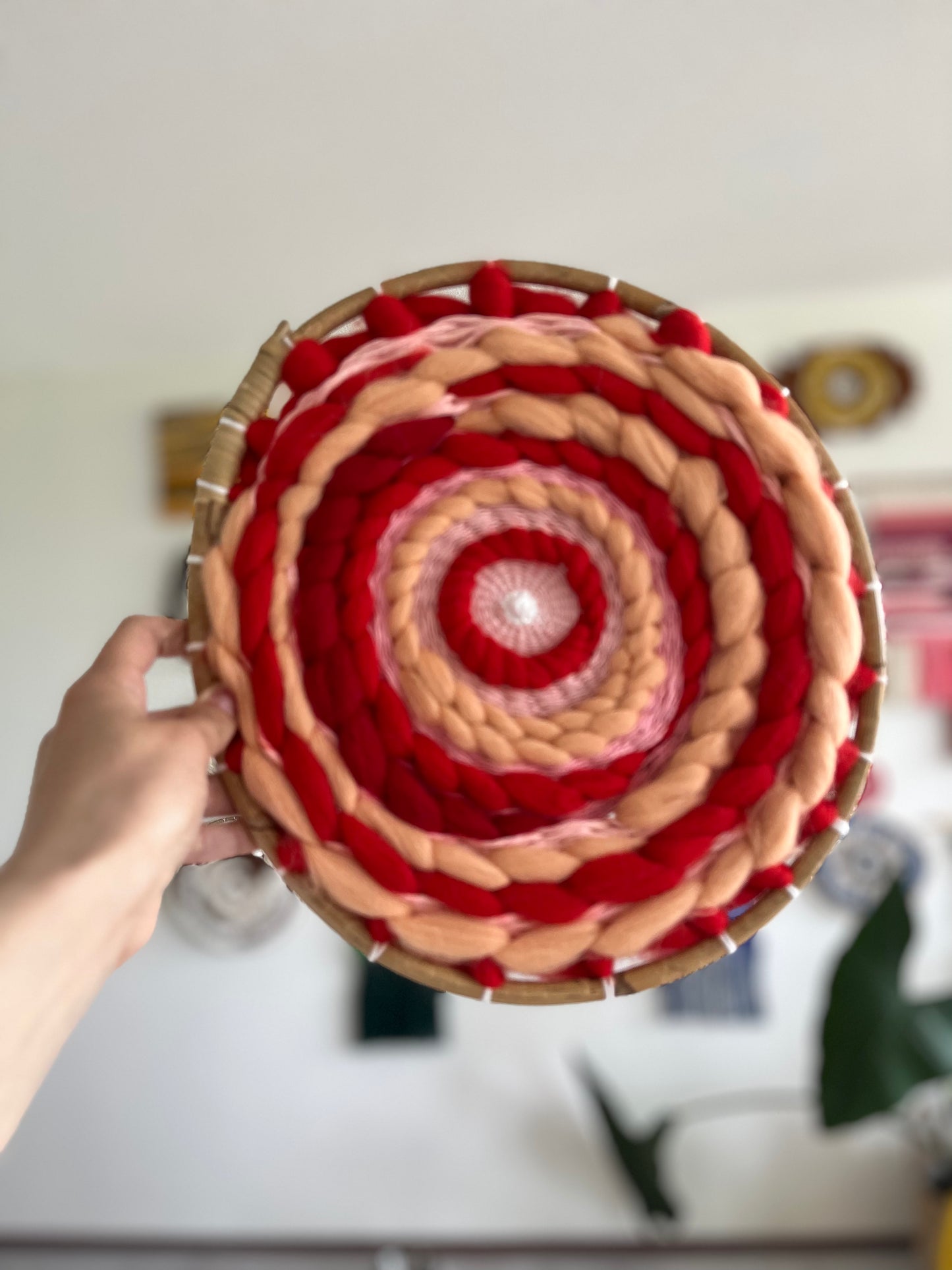 Peachy and red circular weaving