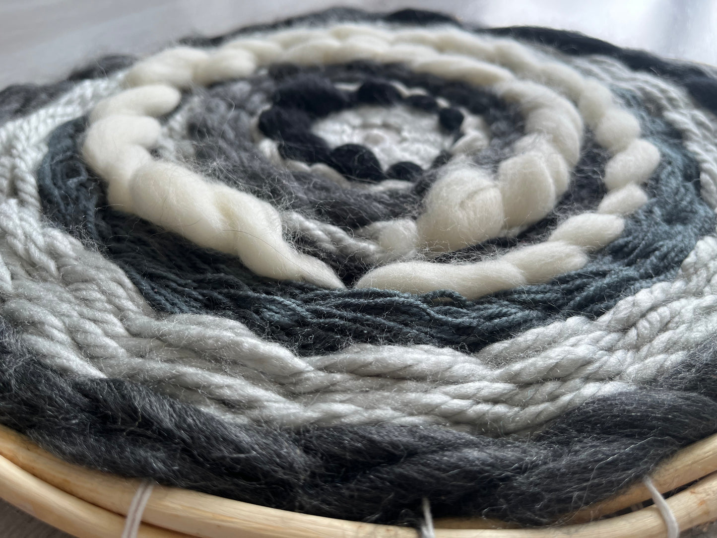 Black,white and grey circular weaving