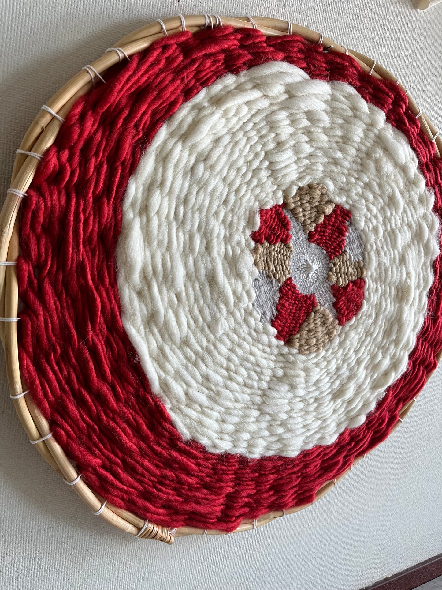 Red and white circular weaving