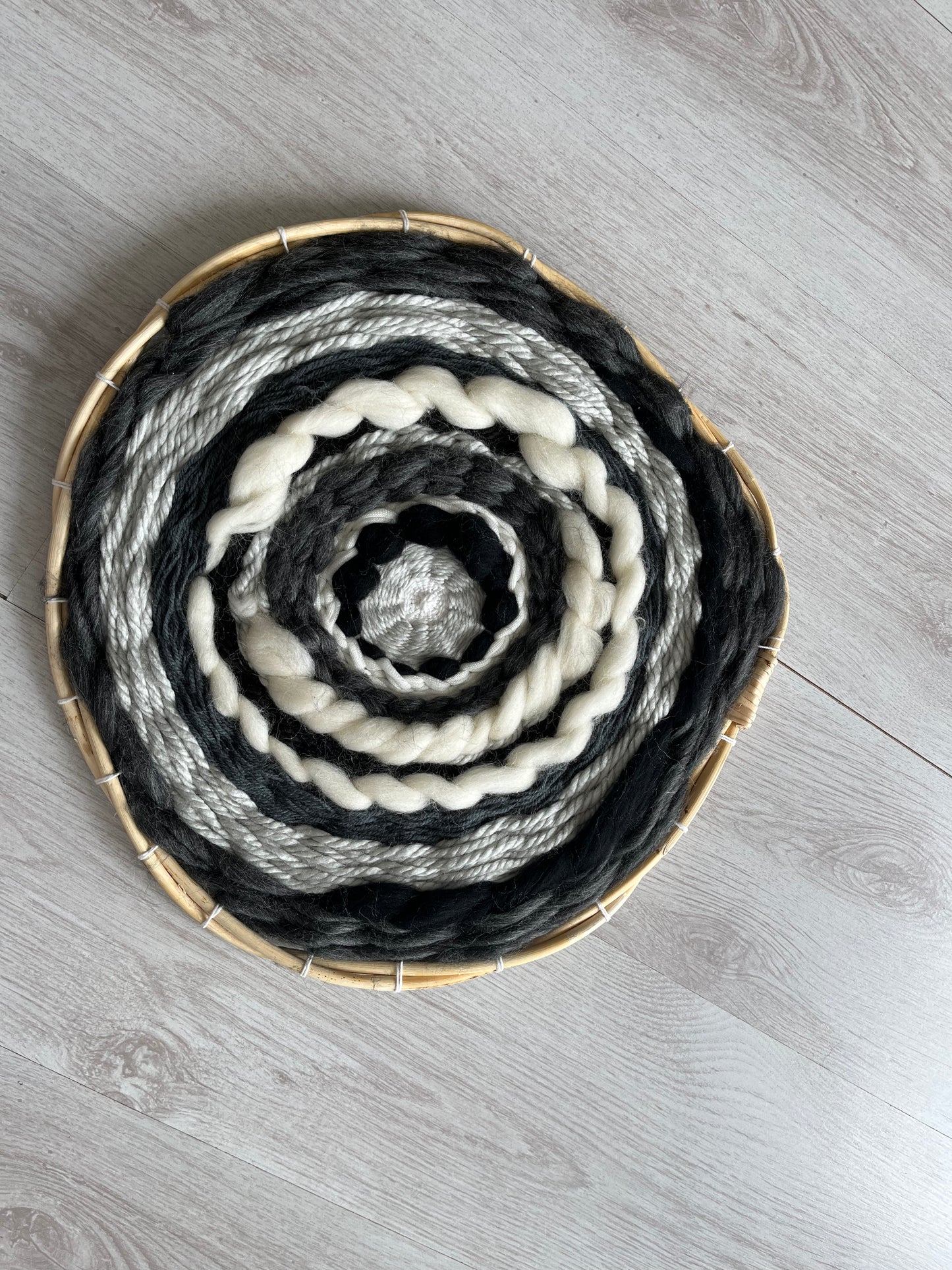 Black,white and grey circular weaving