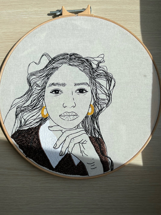 Hanembroidered portrait of a woman, embroidery hoop, wall art