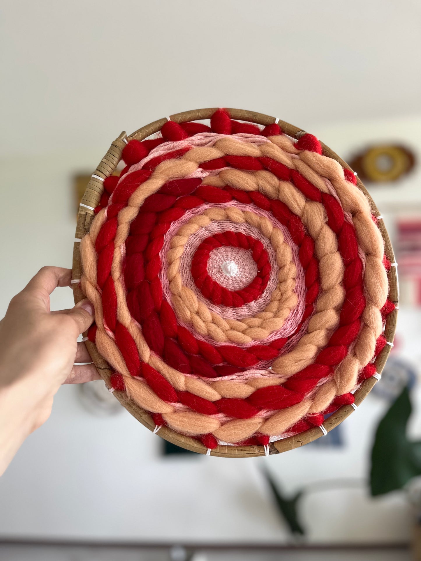 Peachy and red circular weaving