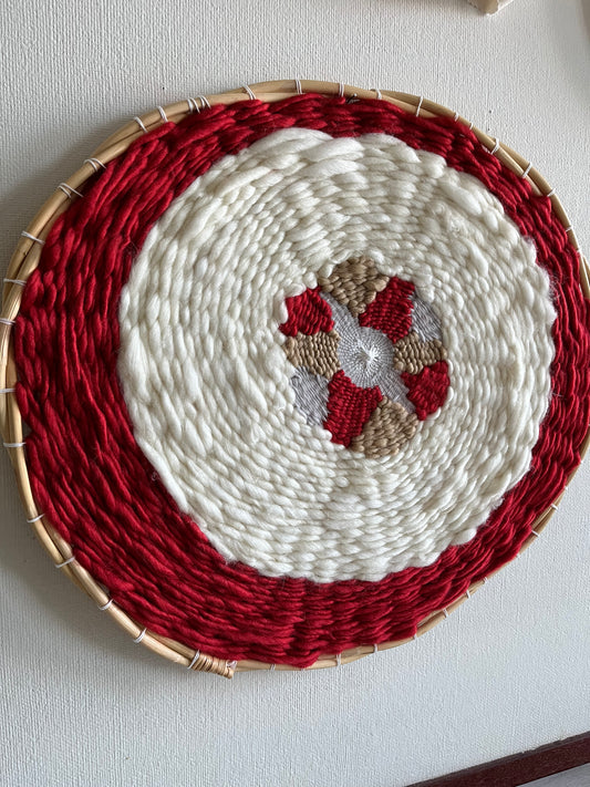 Red and white circular weaving