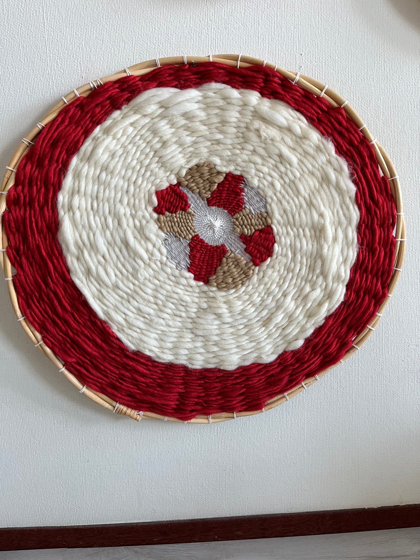 Red and white circular weaving