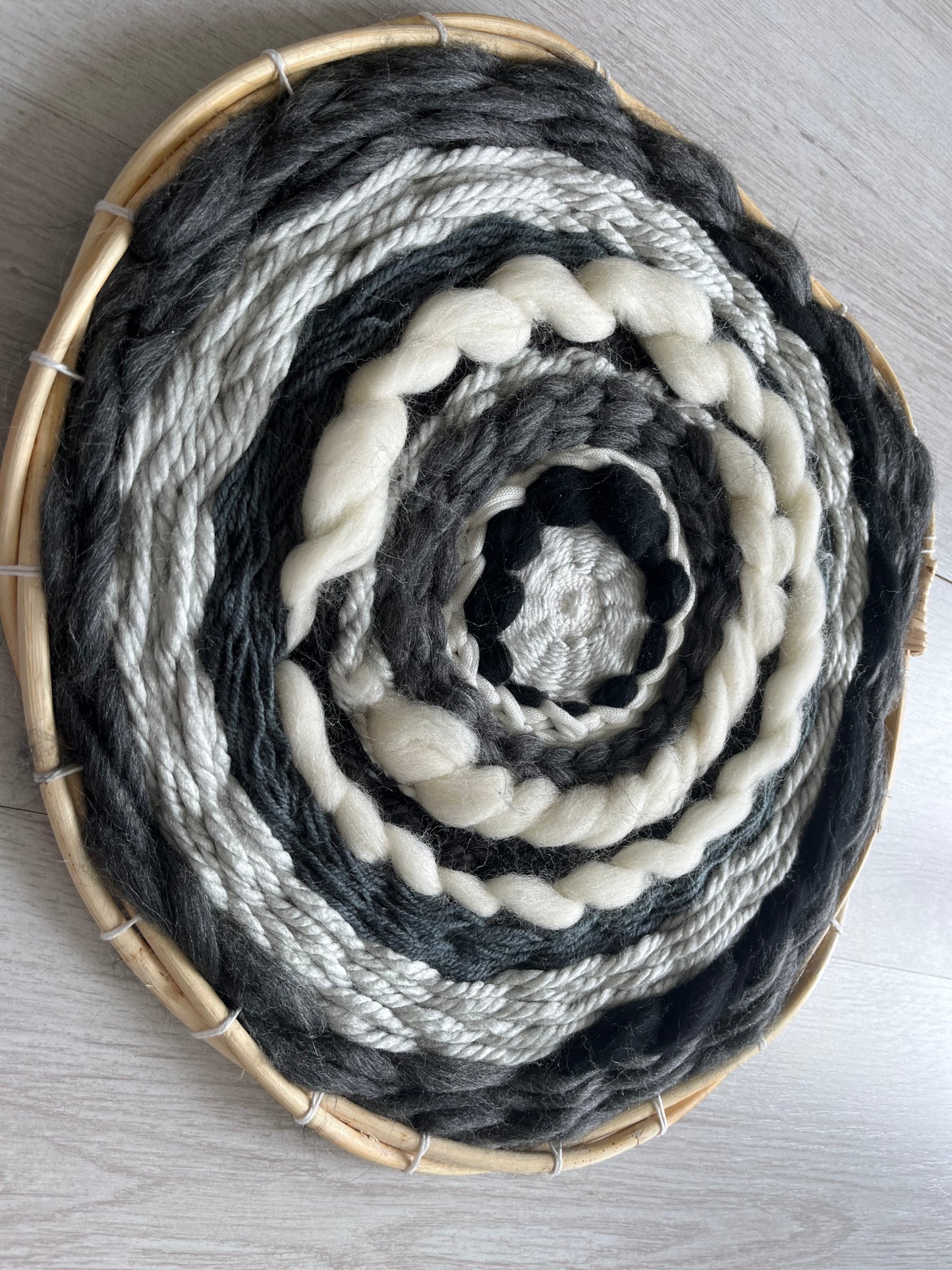 Black,white and grey circular weaving